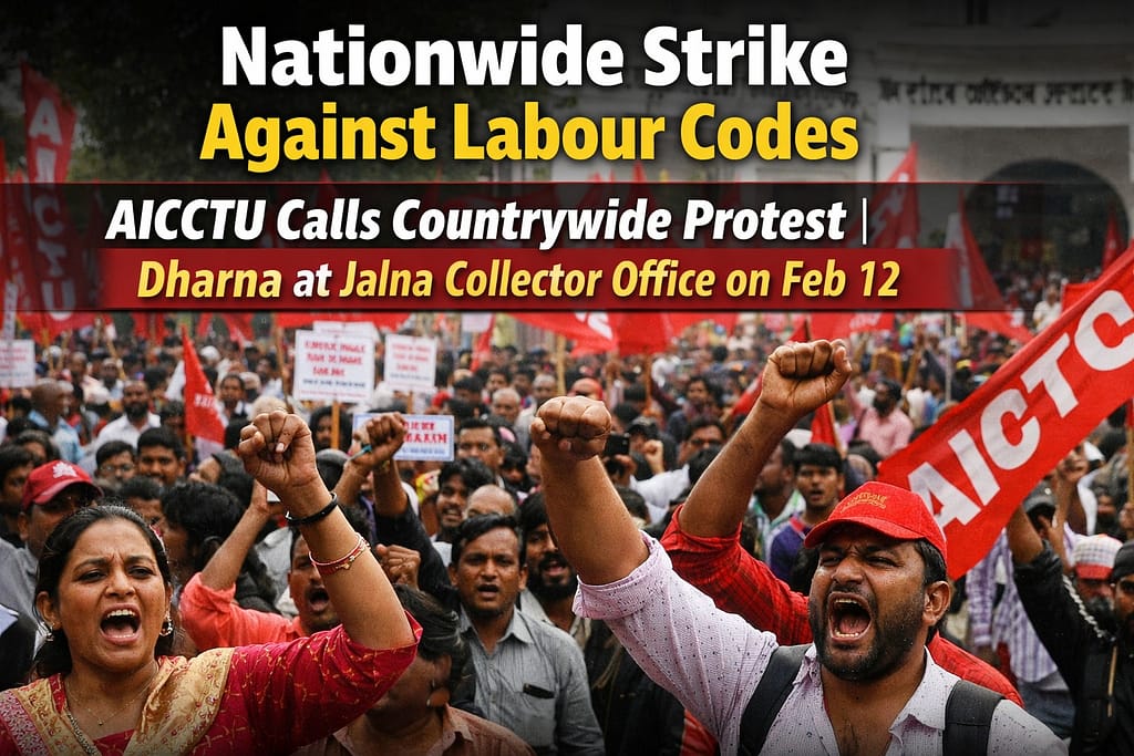 888888 - NewsNation Online Crowd participating in a nationwide strike against labour codes, holding banners and shouting slogans at a protest in Jalna, India.